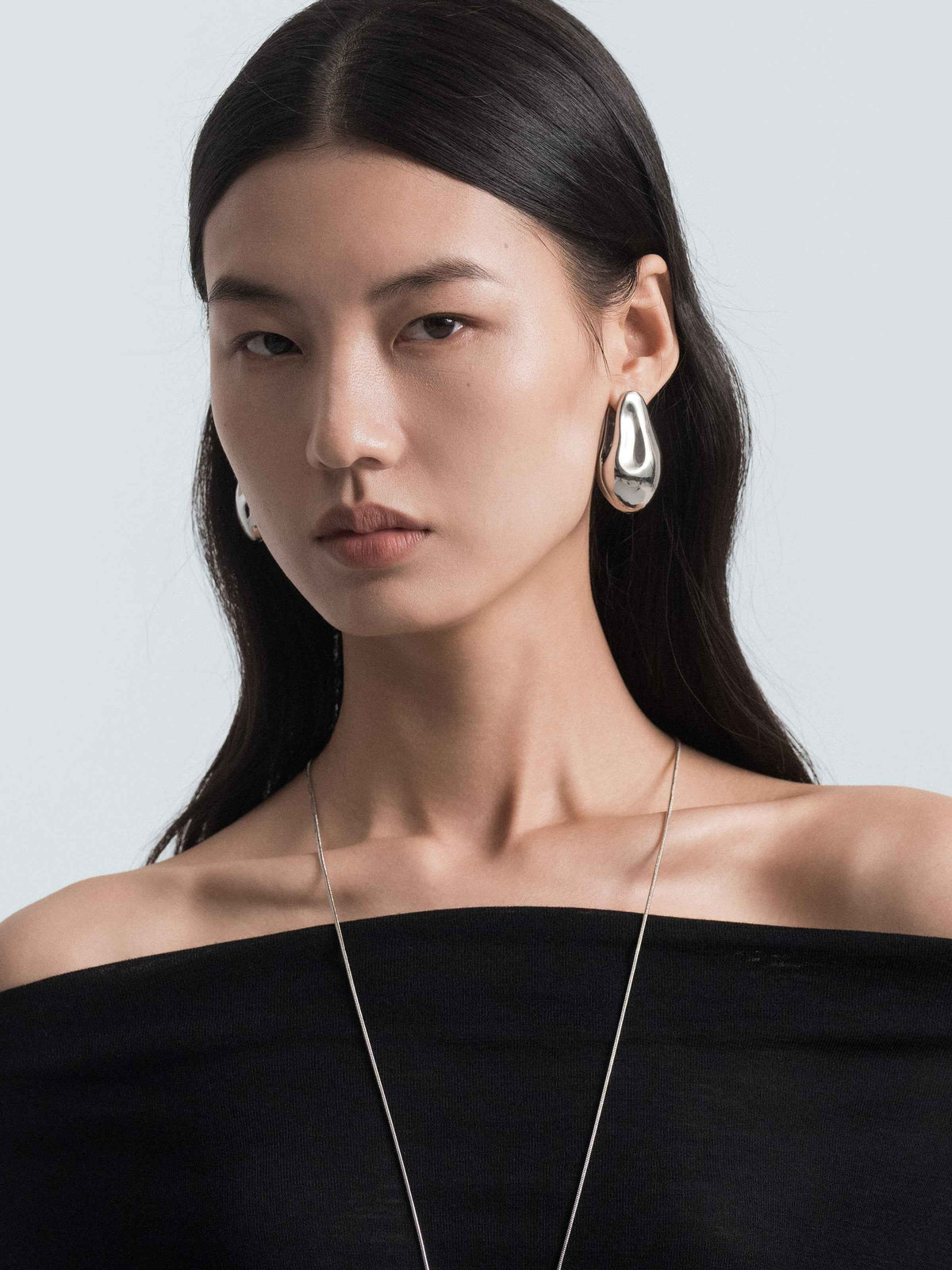 Double‑Sided Teardrop Earrings
