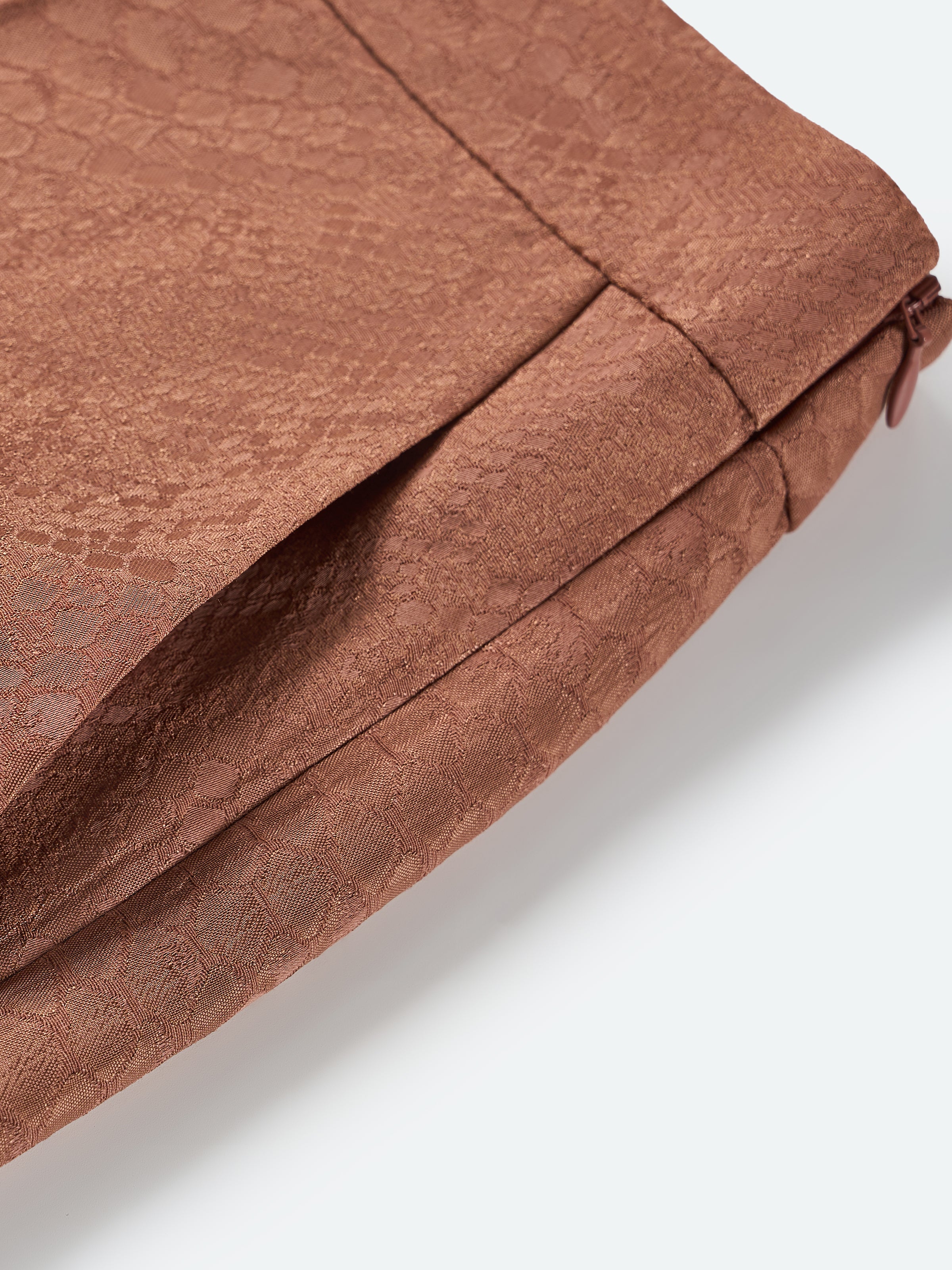 Nude brown textured fabric for wide-leg trousers, fabric detail