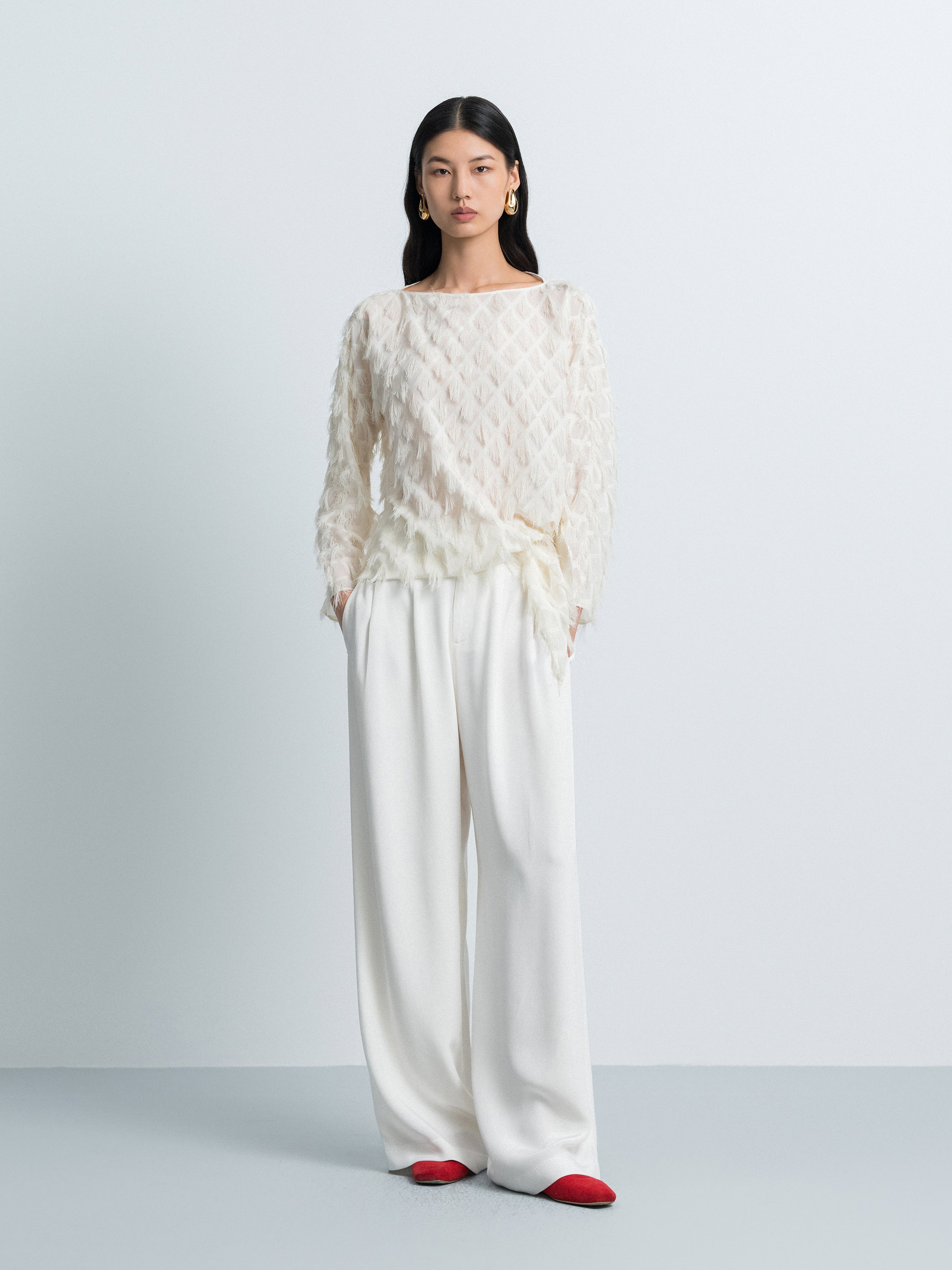 Asymmetric Hem Top with Tassel Details