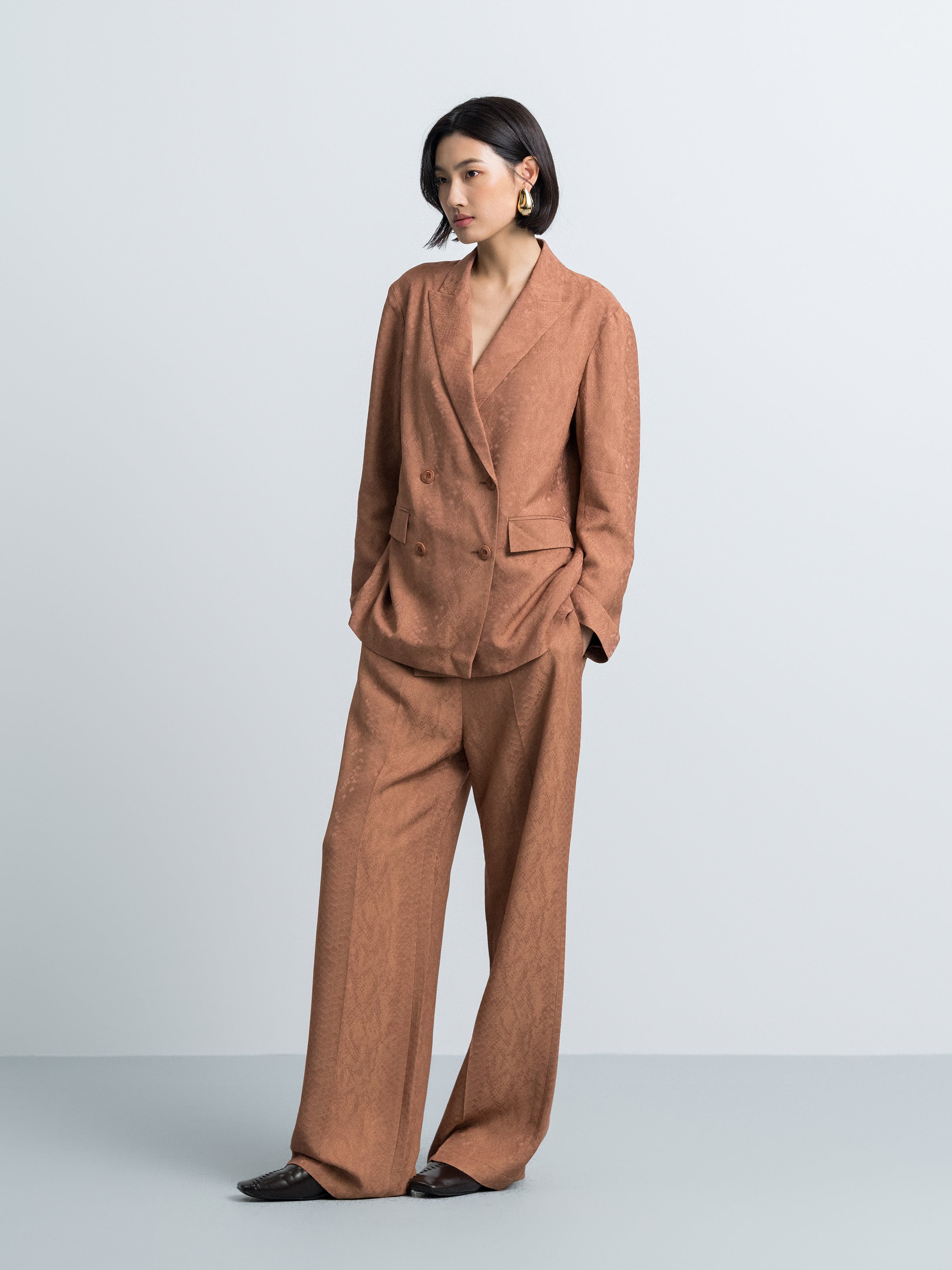 Nude straight-fit blazer with notch lapels and two-button front, flap pocket