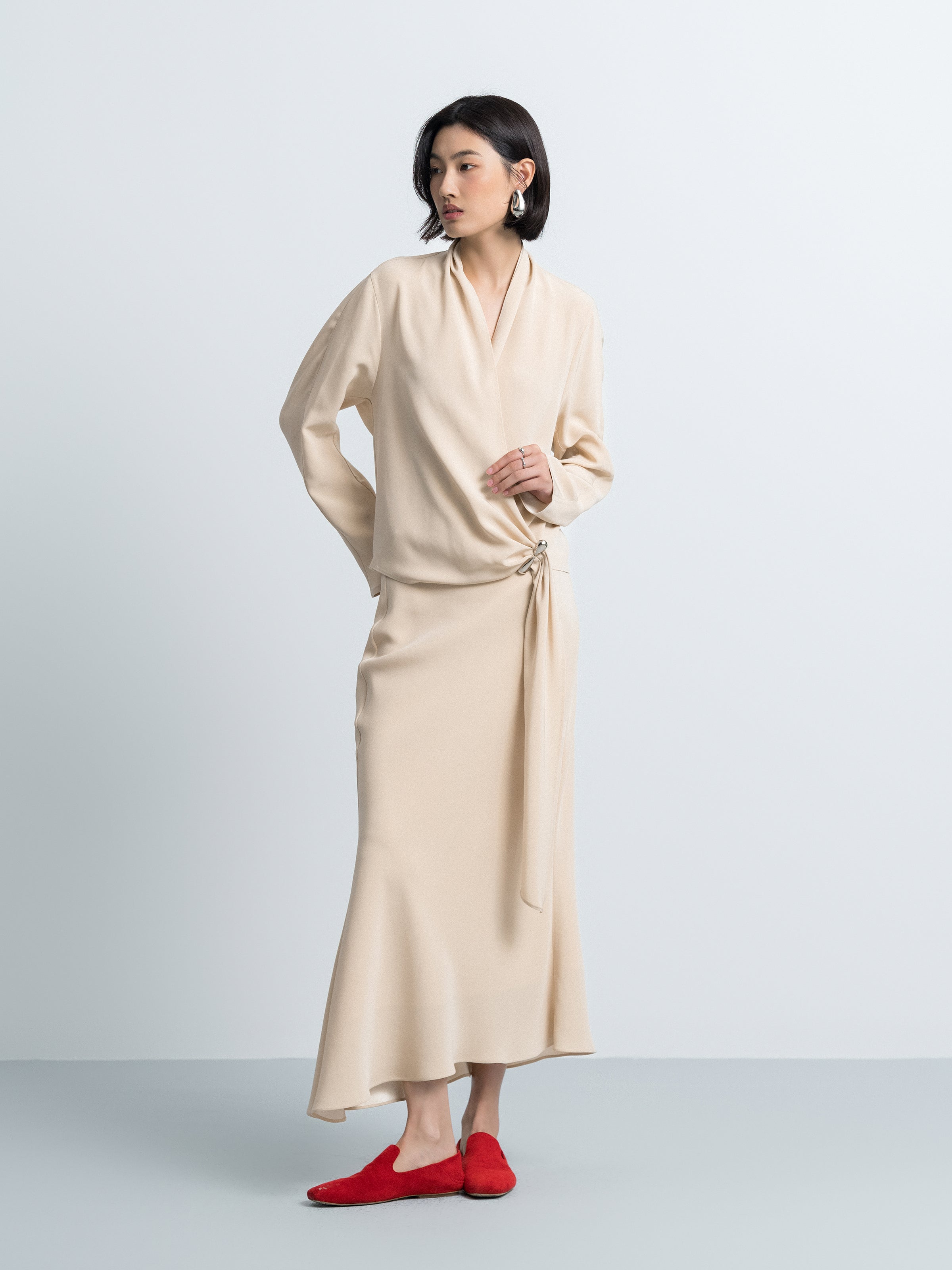 Beige yellow mermaid skirt with asymmetric hem, ruched waist tie detail