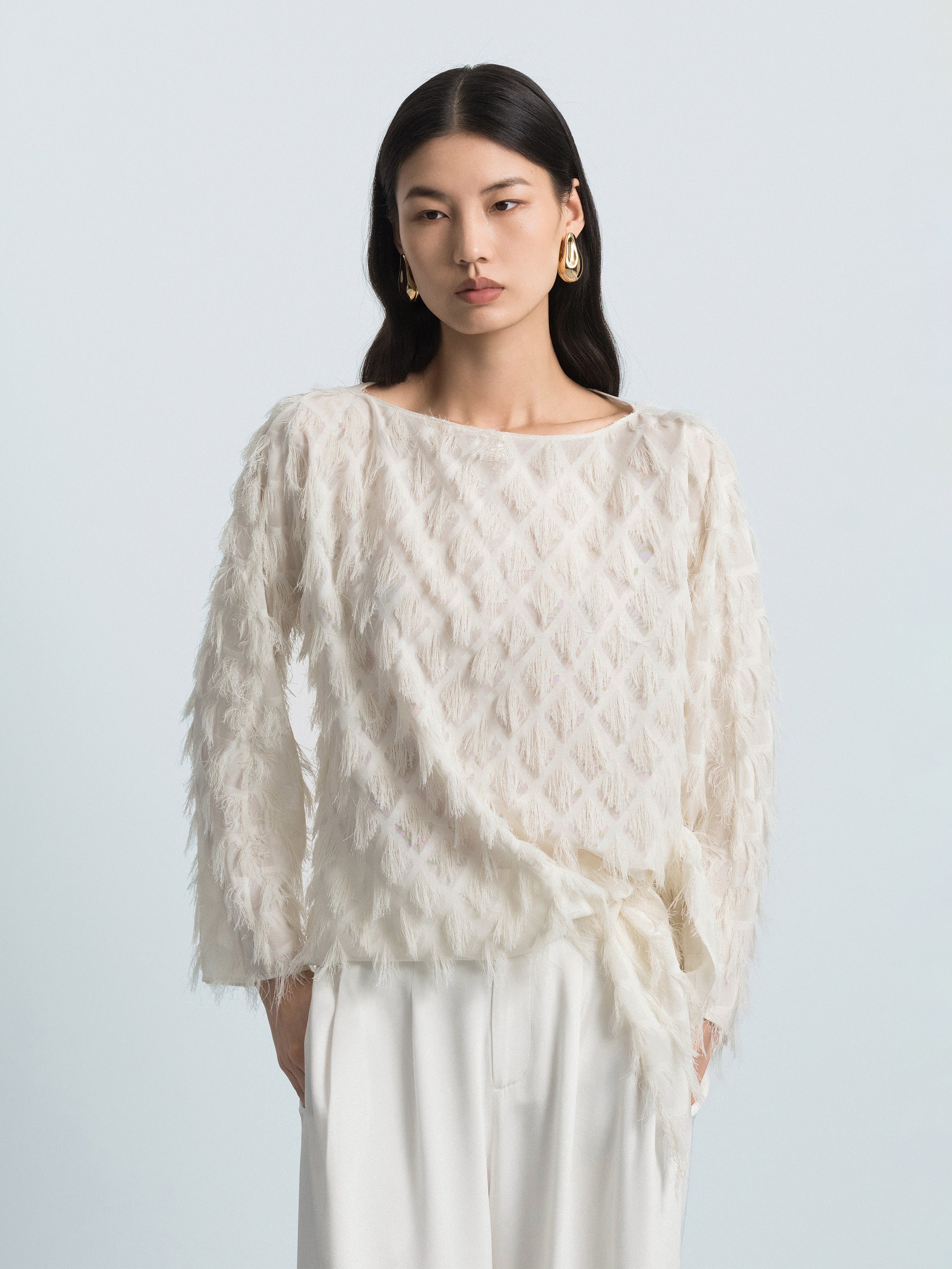 Asymmetric Hem Top with Tassel Details