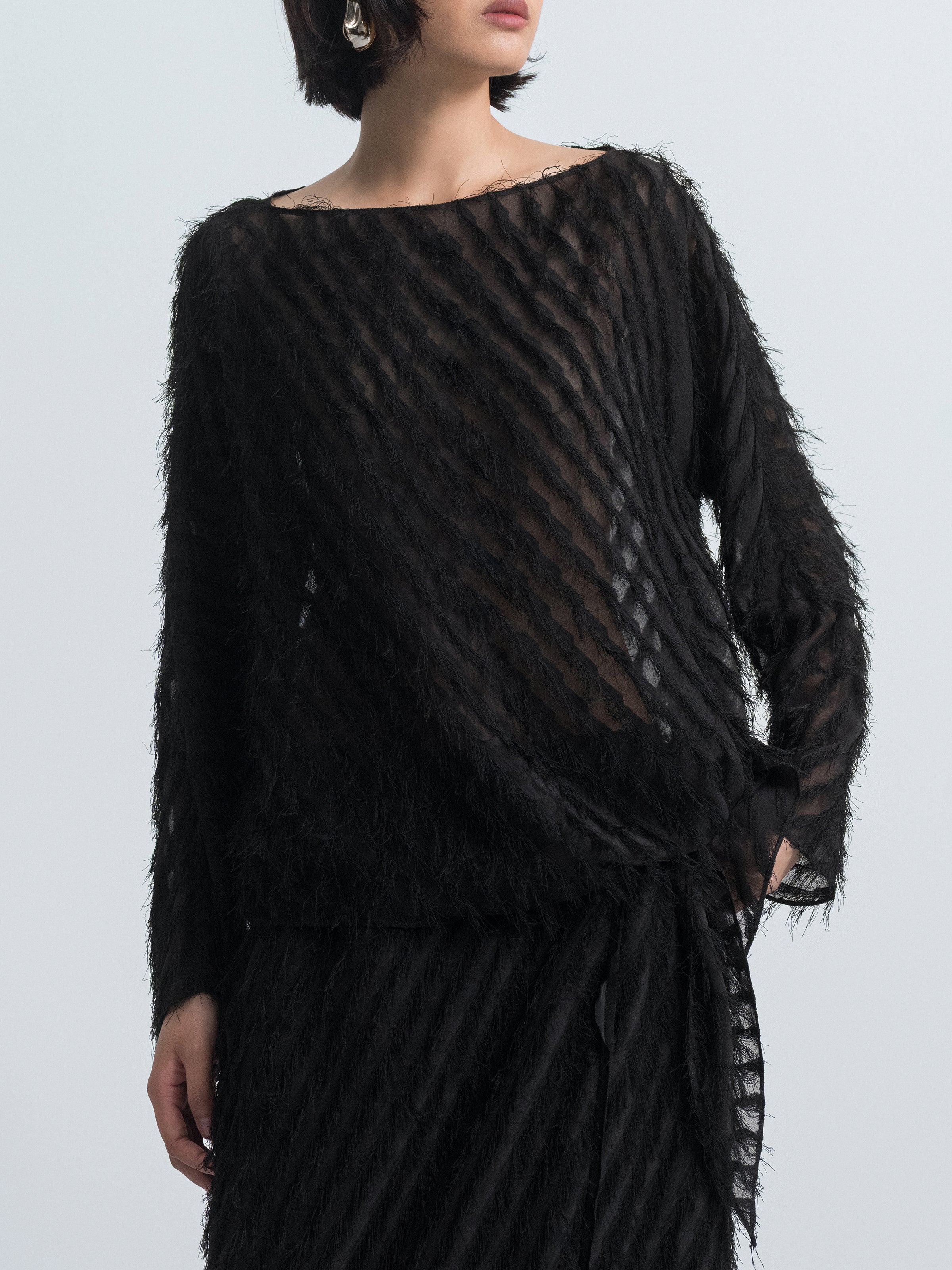 Asymmetric Hem Top with Tassel Details